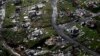 FILE - Destroyed communities are seen in the aftermath of Hurricane Maria in Toa Alta, Puerto Rico, Sept. 28, 2017. Puerto Rico's governor demanded action from U.S. Congress after announcing Feb. 27, 2018, that the Treasury Department has cut a nearly $5 