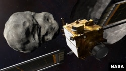 This artist’s illustration depicts NASA’s DART spacecraft, which will be launched to crash into an asteroid to see how the crash affects the space object’s path. (Image Credit: NASA/Johns Hopkins APL)