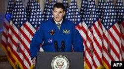 Canadian astronaut and fighter pilot Jeremy Hansen speaks at the U.S. National Space Council meeting in the Andrew W. Mellon Auditorium in Washington on Dec. 20, 2023.