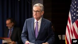 Federal Reserve Chairman Jerome Powell walks to the podium during a news conference in Washington, July 31, 2019.