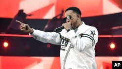 FILE - Ludacris performs before the start of the NBA All-Star basketball game in Los Angeles, Feb. 18, 2018. Ludacris and Migos will represent Atlanta and hip-hop culture when they perform at the EA SPORTS BOWL days before Super Bowl LIII.