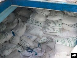 In this photo released by the U.S. Navy, urea and ammonium perchlorate are seen on a dhow intercepted in the Gulf of Oman on Nov. 8, 2022.