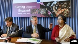 ILO Director-General Guy Ryder (L), EU trade commissioner Karel De Gucht and Bangladeshi Foreign Minister Dipu Moni attend a meeting in Geneva with employee, industry and employer representatives focused on agreeing on ways to improve trade and sustainable development in the ready-made garment industry in Bangladesh, July 8, 2013. 