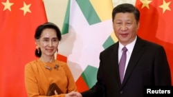 中国国家主席习近平和缅甸领导人昂山素季（2017年5月16日资料照）