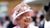 FILE - Britain's Queen Elizabeth arrives for a Royal Garden Party at Buckingham Palace in London, May 29, 2019.
