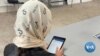 Afghan Refugees Get Technology to Easier Adapt to Life in US