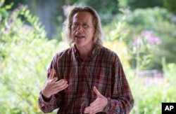 Jonathon Keats, an American conceptual artist, speaks to workshop participants on Saturday, Sept. 18, 2021, in Atlanta.