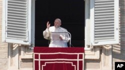 Pope Francis delivers the Angelus noon prayer from his studio window overlooking St. Peter's Square at the Vatican, Feb. 6, 2022.