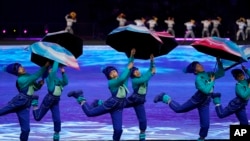 Dancers perform during the pre-show ahead of the opening ceremony of the 2022 Winter Olympics, Feb. 4, 2022, in Beijing.