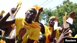 Supporters of Togolese main opposition presidential candidate Jean-Pierre Fabre rally in Lome, March 2, 2010 file photo.