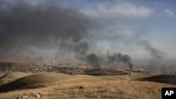 Une photo d'archives du 12 novembre 2015 près de Sinjar, dans le nord de l'Irak. (AP Photo/Bram Janssen)