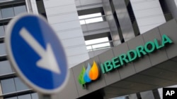 FILE - This Dec. 29, 2012, photo, shows the exterior of Spanish energy company Iberdrola in Madrid. Iberdrola is suing the holding company of business news site El Confidencial over coverage of an industrial espionage case.