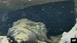 Images from a remote-controlled submersible robot show damaged areas inside the Fukushima nuclear power plant, Feb. 9, 2022. (IRID/Hitachi-GE Nuclear Energy, Ltd. via AP)