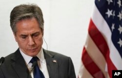Secretary of State Antony Blinken listens during a joint news conference at the Quad foreign ministers meeting in Melbourne, Australia, Feb. 11, 2022.