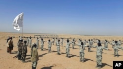 FILE - Taliban border fighters take part in a training exercise in Lashkar Gah, Helmand province, southwestern, Afghanistan, Oct. 25, 2021.