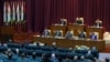 FILE - Libyan parliament meets to discuss approving new government, in Sirte, March 8, 2021.