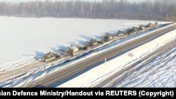 Russian tanks of the Western Military District units allegedly return to their permanent deployment site. February 15, 2022. (Russian Defense Ministry/Handout via REUTERS) 