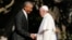 U.S. President Barack Obama, left, greets Pope Francis upon his arrival at the White House in Washington, Sept. 23, 2015. 