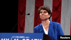 FILE - Democratic congressional candidate Amy McGrath thanks her supporters after conceding in 2018 congressional elections, in Richmond, Kentucky, Nov. 6, 2018.