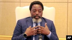 Democratic Republic of Congo's President Joseph Kabila speaks during an interview by the Associated Press at the Nation's Palace in Kinshasa, Dec. 9, 2018. 