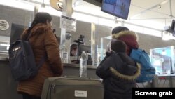 Asylum-seekers who were a part of the Trump administration's Migrant Protection Protocols, known as the "Remain in Mexico" program, are processed at the San Ysidro, California, port of entry. 