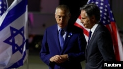U.S. Secretary of State Antony Blinken, right, is welcomed by U.S. Ambassador to Israel Jacob Lew as he arrives at Ben Gurion Airport near Tel Aviv, Israel, on April 30, 2024.