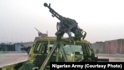 Un véhicule de Boko Haram abandonné après une attaque contre Dikwa, Borno State, Nigéria, 24 février 2016.