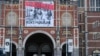 Museum Rijks, Museum Nasional di Amsterdam dengan menampilkan poster pameran, “Revolusi! Indonesia Merdeka”, Rabu, 9 Februari 2022. (AP/Mike Corder)