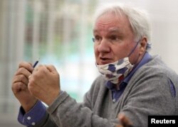U.N. official Matthias Schmale, gestures during a press briefing in Gaza City on Feb. 1, 2021.