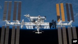 An undated photo provided by NASA shows the International Space Station in orbit. (NASA via AP)