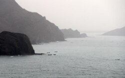 FILE - Yemeni fishing boats are seen along the Yemeni side of the strategic Strait of Bab al-Mandab, Aug. 10, 2018.