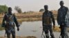 Police officers patrol in Kiir Adem in South Sudan, where six policemen were killed at the weekend in a raid blamed on nomads from Sudan. (Courtesy)