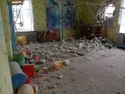 Interior view of a kindergarten in Stanytsia Luhanska in Ukrainian government-held territory after it was hit by an artillery shell on February 17. There were only minor injuries.