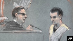 FILE - This artist's depiction shows Massachusetts Air National Guardsman Jack Teixeira, right, in U.S. District Court in Boston, Masachusetts, April 14, 2023.