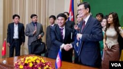 A Palestinian artist decorates the Qahwetna Cafe (Our Coffee) one day ahead of Ramadan, in Gaza City, as the faithful prepare for the start of the Muslim holy month.