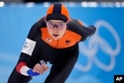 FILE- Sanne In 't Hof of the Netherlands competes in the women's speedskating 5,000-meter race at the 2022 Winter Olympics, Thursday, Feb. 10, 2022, in Beijing.