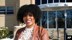 Alexis Knox-Miller, equity director for the Colorado Springs, Colo., school system, poses Friday, Feb. 4, 2022. (AP Photo/David Zalubowski)