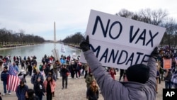 Protesters gather for a rally against COVID-19 vaccine mandates in front of the Lincoln Memorial in Washington, on Jan. 23, 2022.