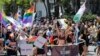 FILE - Participants with the Alliance for LGBTQ Youth march at the annual Miami Beach Gay Pride Parade, April 9, 2017, in Miami Beach, Florida.