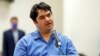 Ruhollah Zam, a dissident journalist who was captured in what Tehran calls an intelligence operation, speaks during his trial in Tehran, Iran, June 2, 2020. 