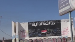 Iraqi Forces, Shi'ite Militias Press Offensive to Retake Tikrit