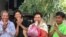 Ouch Leng (third from the left), Goldman Environmental Prize 2016 and three other environmental activists are released after being detained for four days. (Courtesy photo of CCHR) 