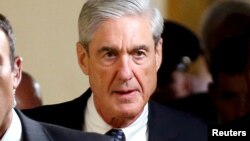 FILE - Special Counsel Robert Mueller departs after briefing members of the U.S. Senate on his investigation into potential collusion between Russia and the Trump campaign on Capitol Hill in Washington, June 21, 2017.