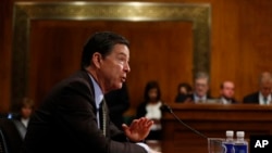 FILE - Direktur FBI James Comey bersaksi di Capitol Hill di Washington, Rabu, 3 Mei 2017, sebelum sidang Komite Yudikatif Senat: "Pengawasan Biro Investigasi Federal." (AP Photo / Carolyn Kaster)