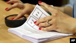 FILE - Counting of votes begins in the Irish referendum on the 8th Amendment of the Irish Constitution, in Dublin, Ireland, May 26, 2018. Ireland will hold a referendum later this year to remove the offense of blasphemy from its constitution.