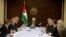Palestinian President Mahmoud Abbas (C) meets with ministers of the unity government, in the West Bank city of Ramallah June 2, 2014. Abbas swore in a Palestinian unity government on Monday under a reconciliation deal with Hamas.