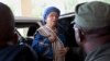 FILE - Liberia's President Ellen Johnson Sirleaf arrives at the Capitol to address lawmakers in Monrovia, Liberia.