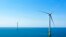 FILE - Two of the offshore wind turbines have been constructed off the coast of Virginia Beach, Va., June 29, 2020. 