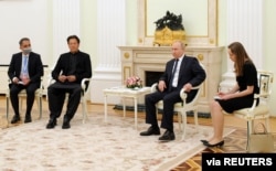 FILE - Russian President Vladimir Putin attends a meeting with Pakistan's Prime Minister Imran Khan in Moscow, Russia, Feb. 24, 2022. (Sputnik/Mikhail Klimentyev/Kremlin via Reuters)