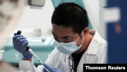 FILE - Chinese graduate students who study STEM fields often stay and work in the United States after graduation.